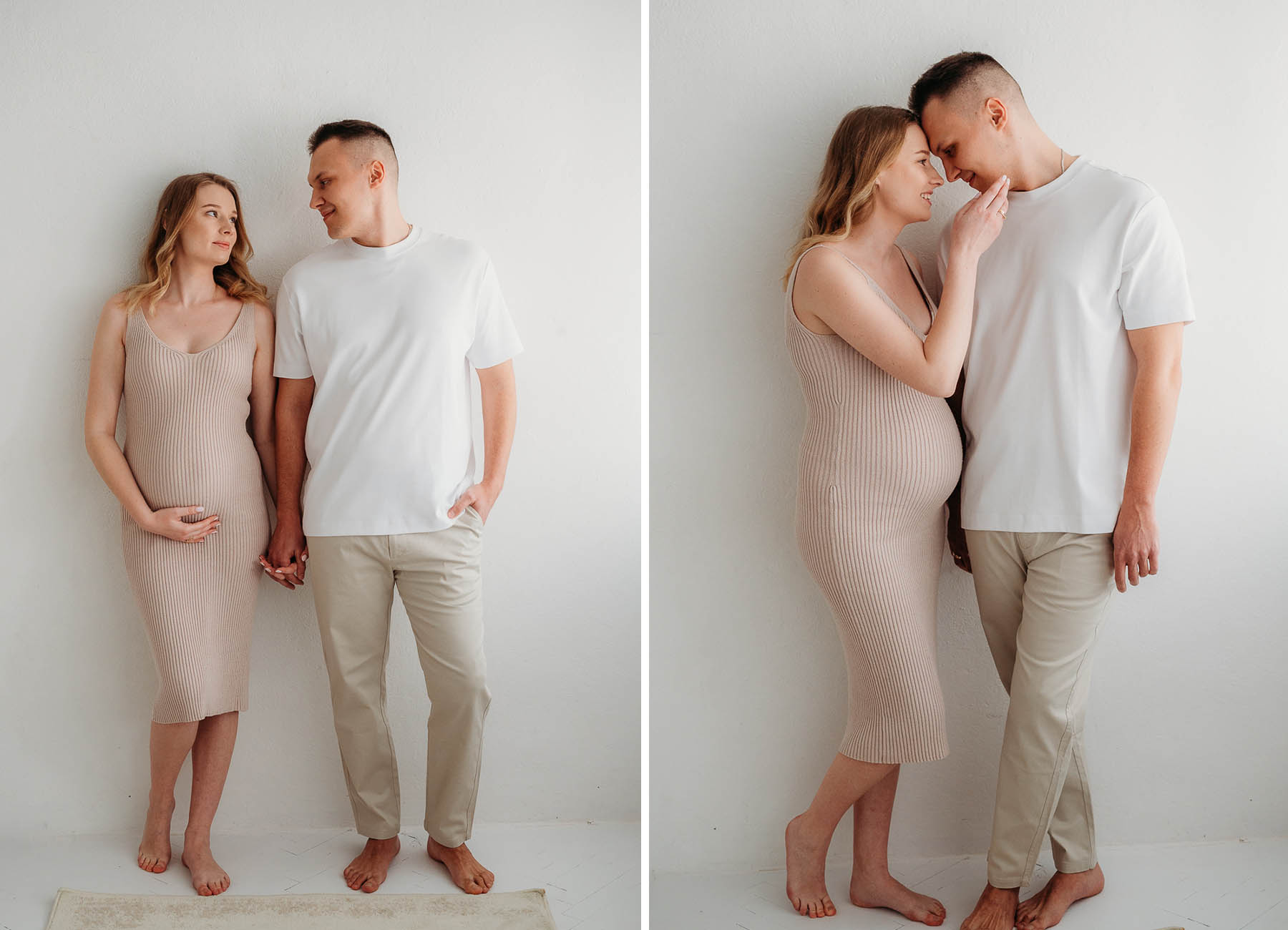 para stoi w studio na tle białej ściany podczas sesji brzuszkowej